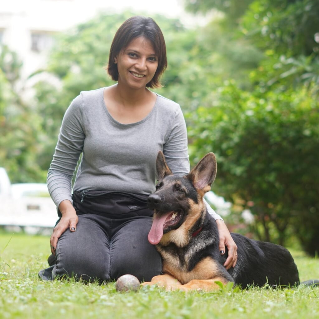 treatsntrain owner and dog trainer kinjal vadher sitting with dog
